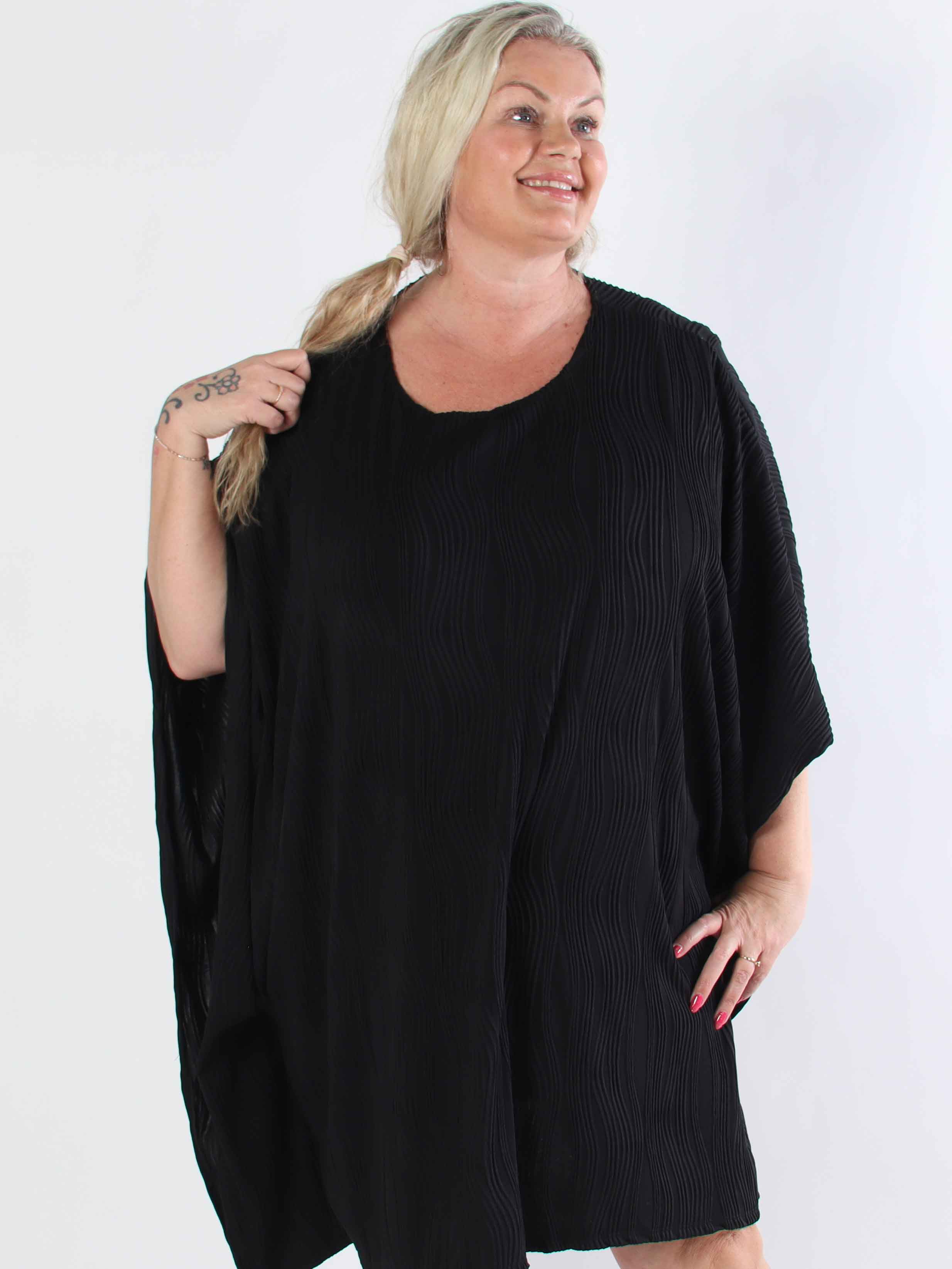 Kaja - Elastisk plus size tunika i blødt rillet stof